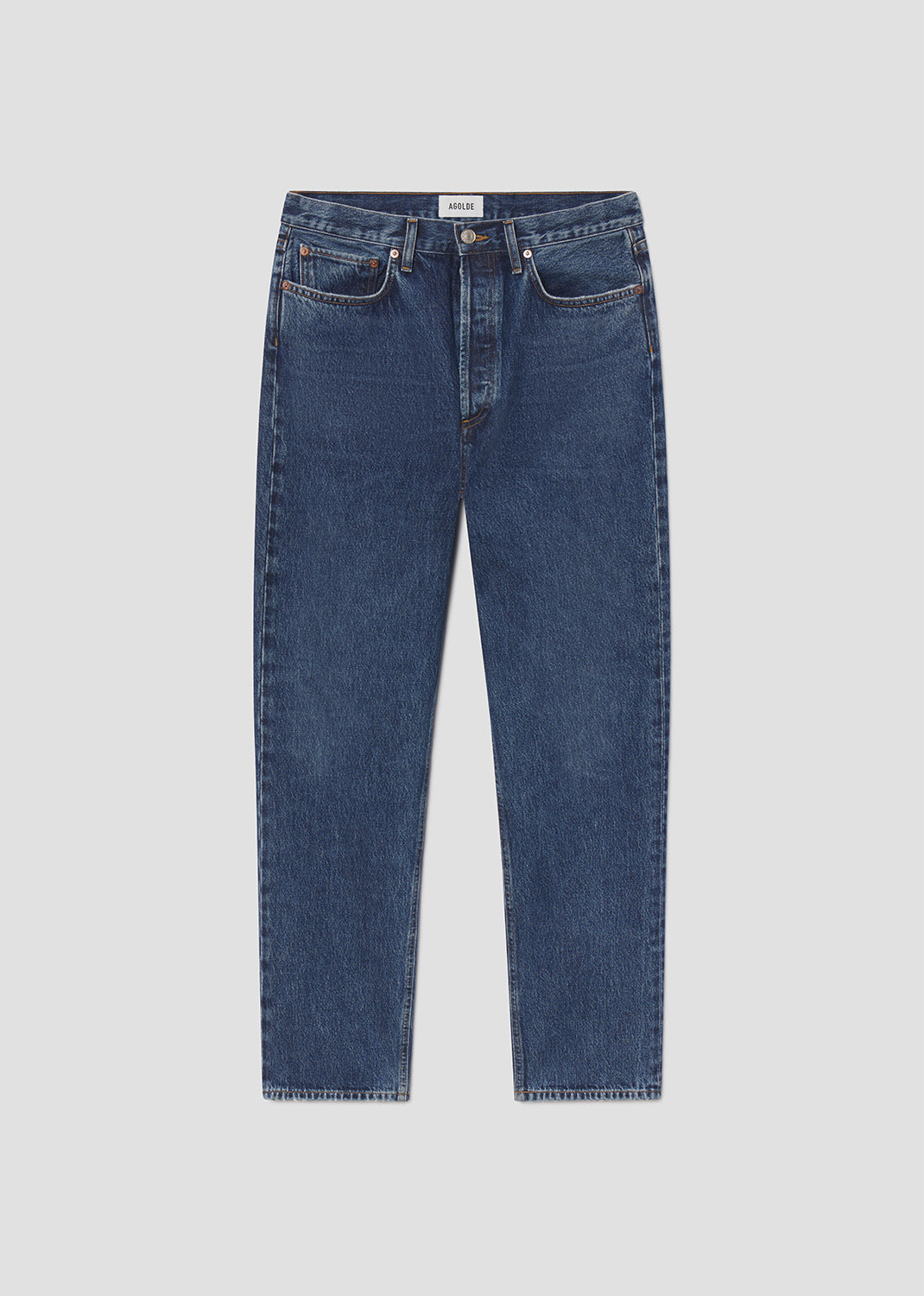 Blue jeans on a light gray background