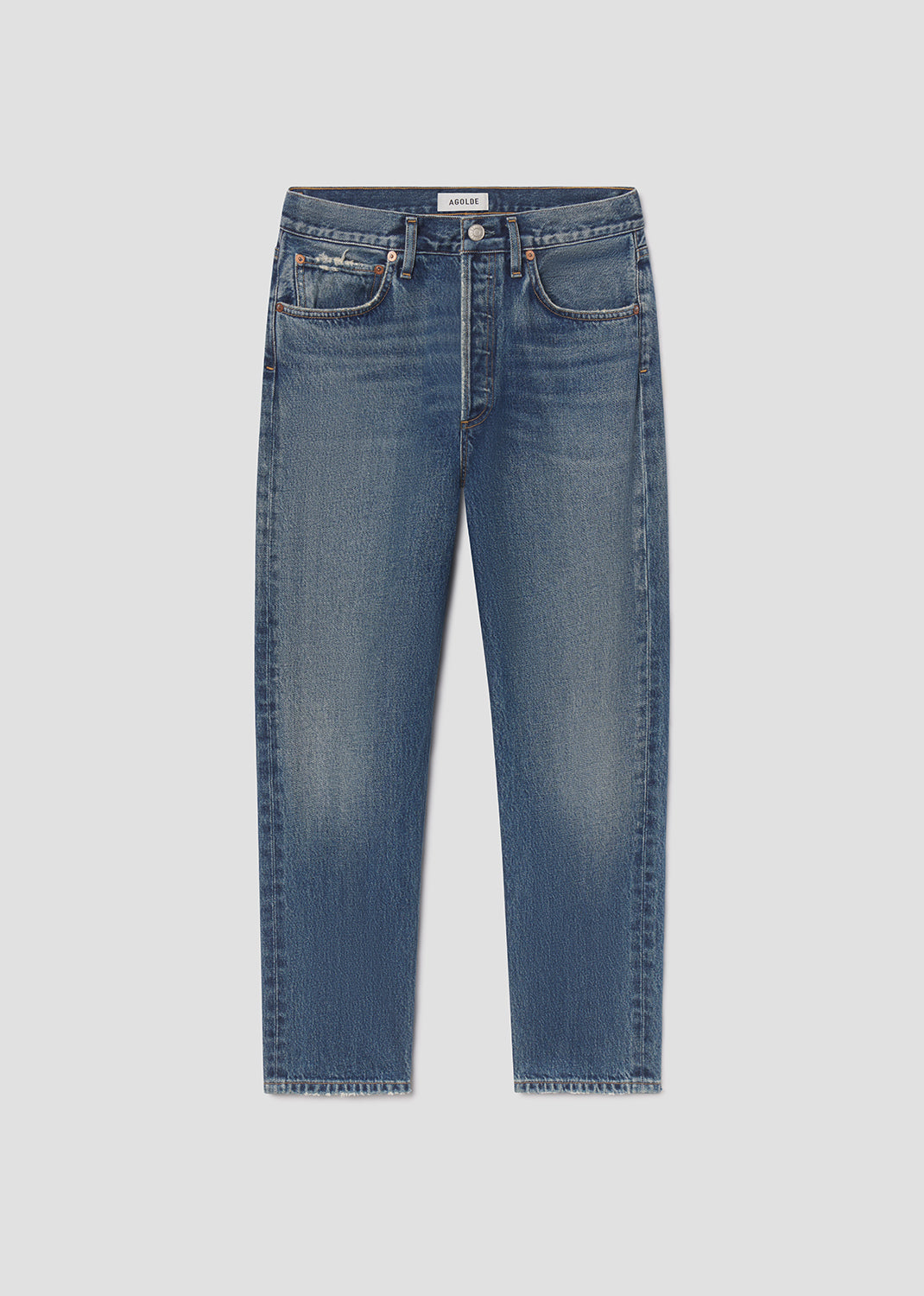 Blue jeans on a light gray background