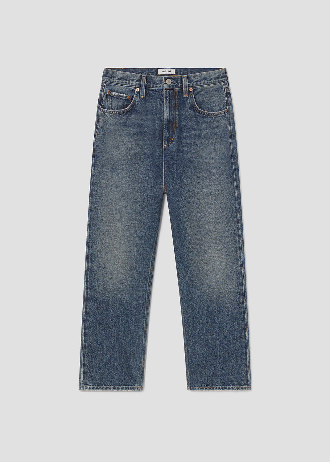 Blue jeans on a light gray background