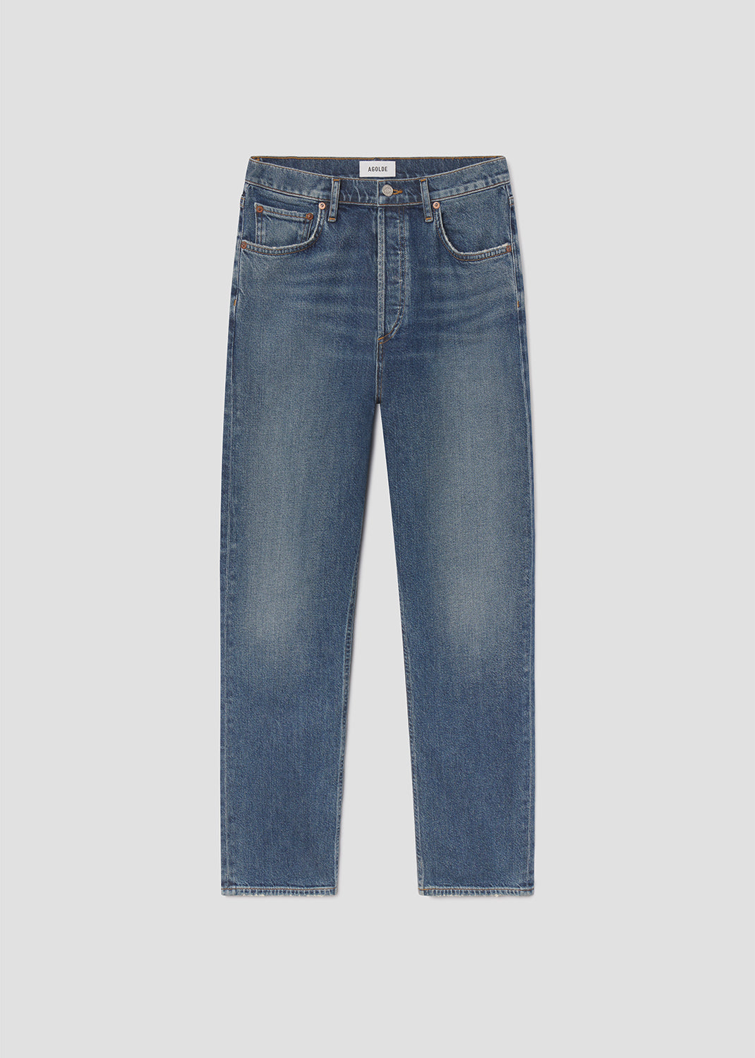 Blue jeans on a light gray background