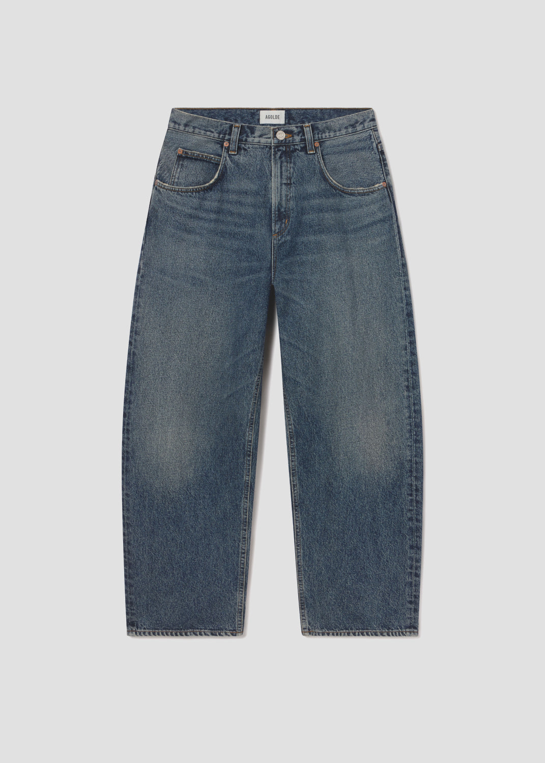 Blue jeans on a light gray background