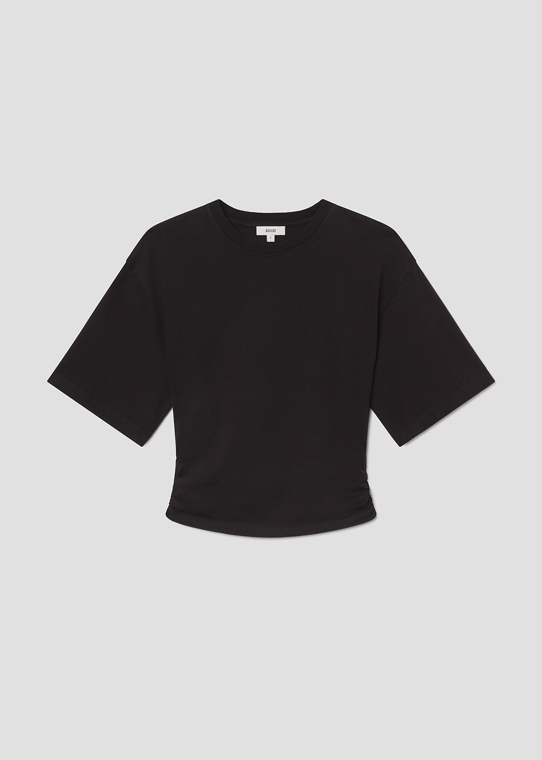 Black t-shirt on a light gray background