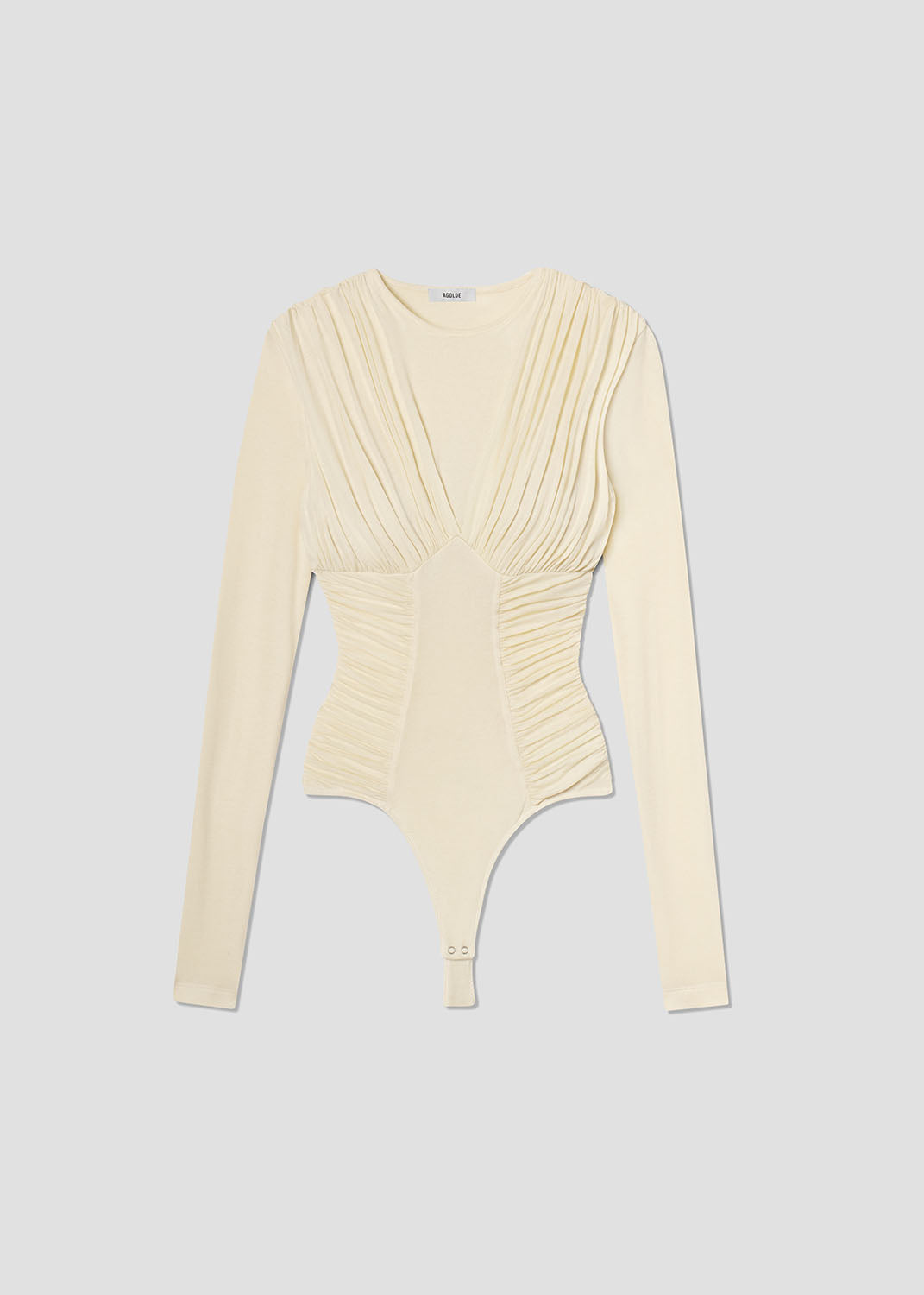 Cream-colored bodysuit with long sleeves on a light gray background