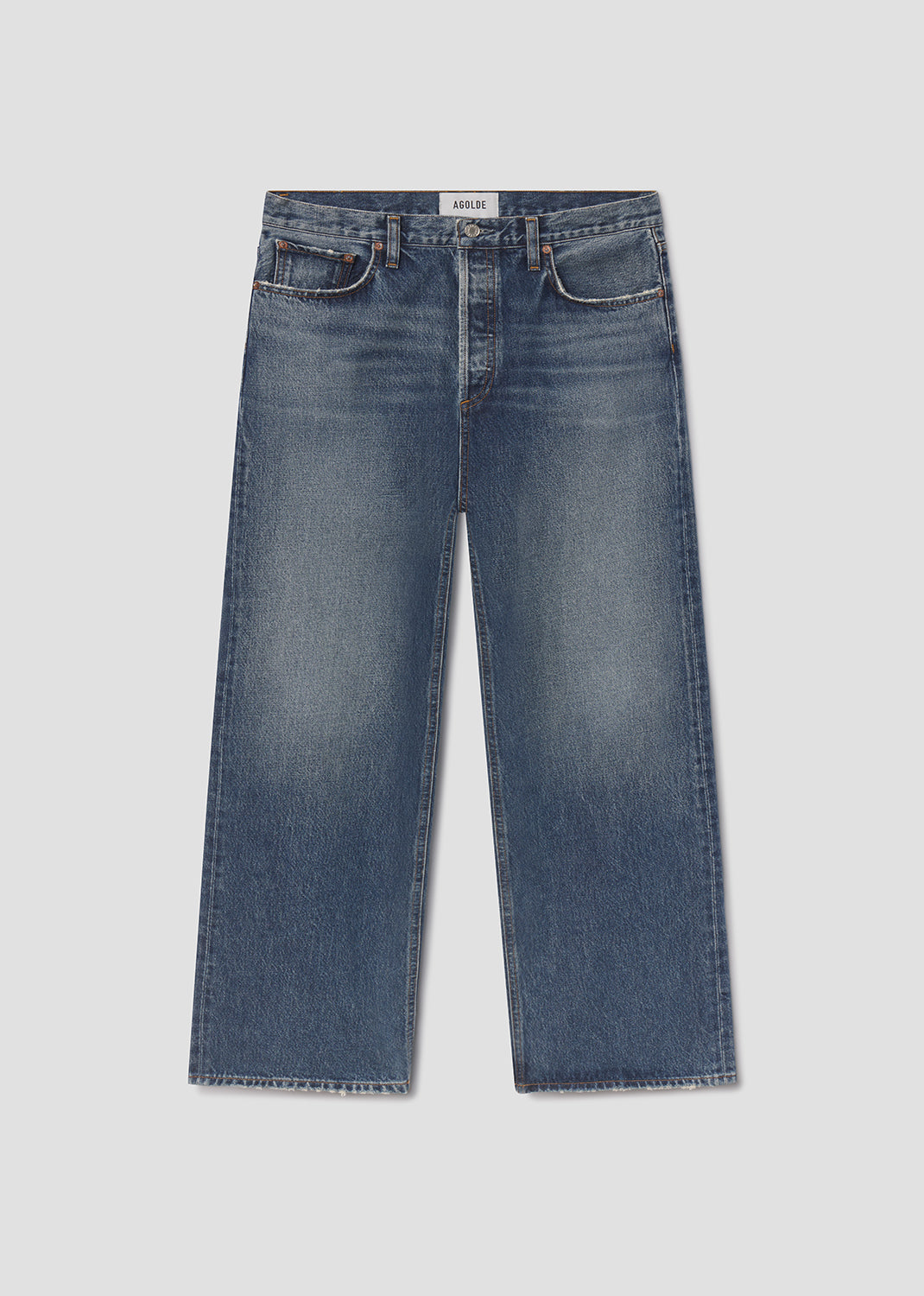 Blue jeans on a light gray background