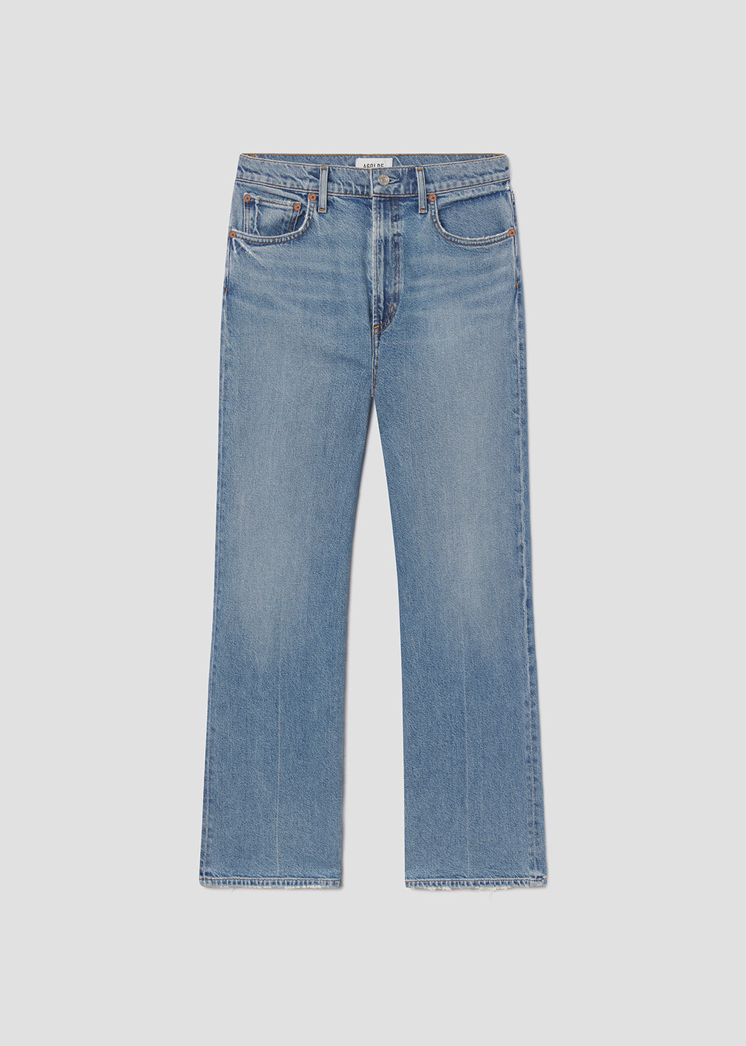 Blue jeans on a light gray background