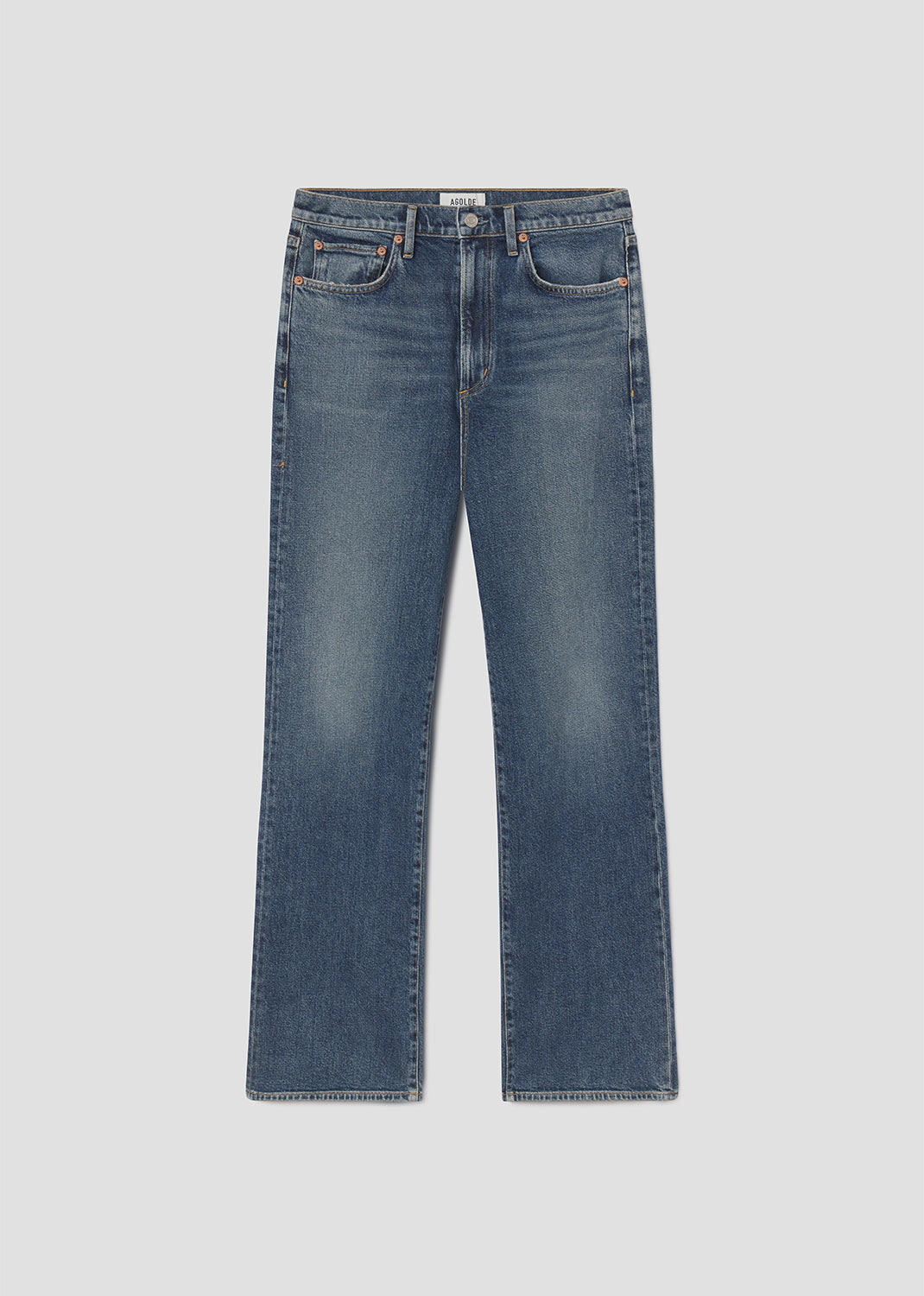 Pair of blue jeans on a light gray background