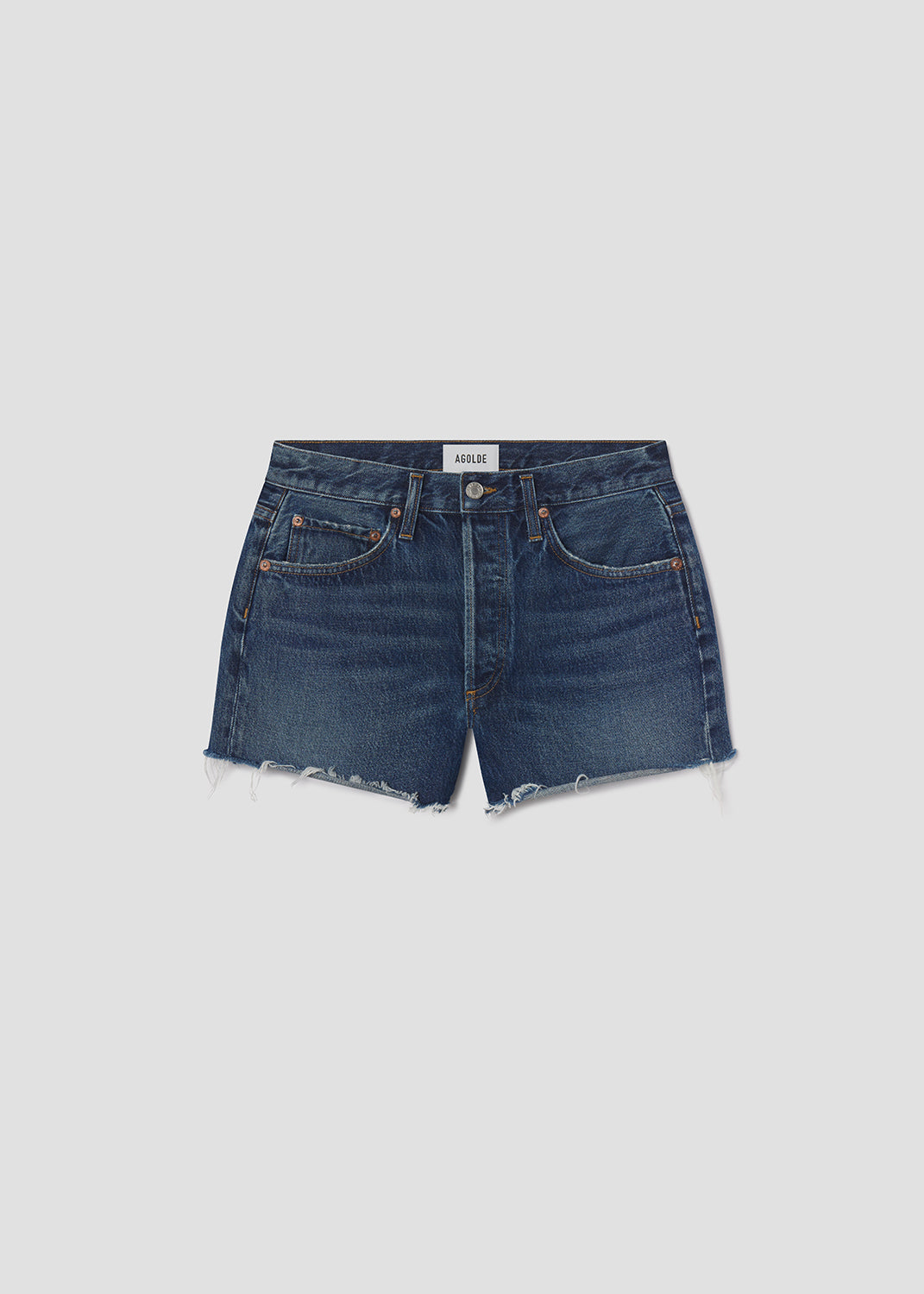 Blue denim shorts on a light gray background