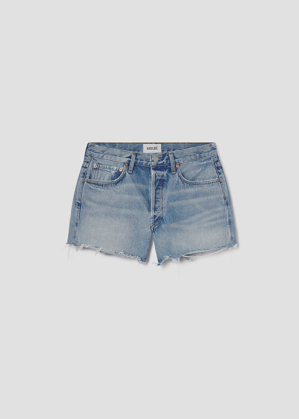 Blue denim shorts on a light gray background