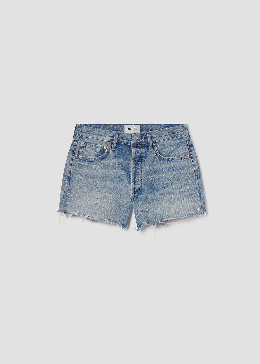 Blue denim shorts on a light gray background