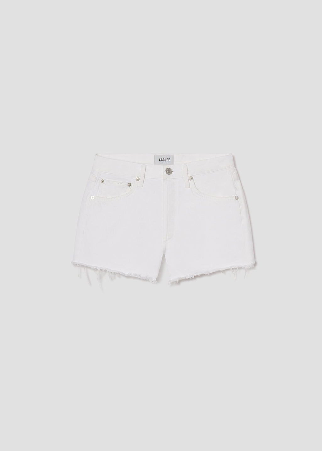 White denim shorts with a brand label on a light gray background