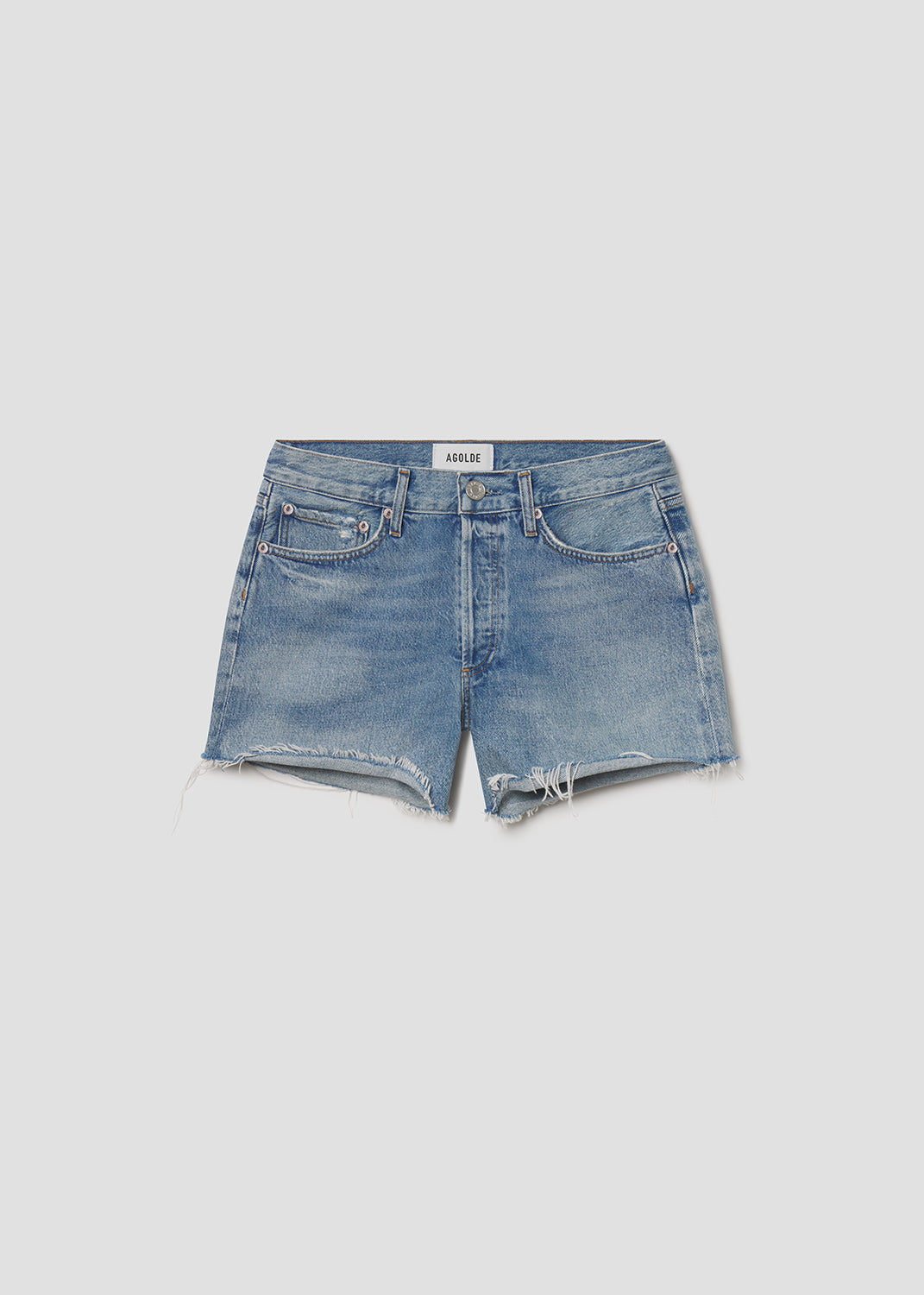Blue denim shorts on a light gray background