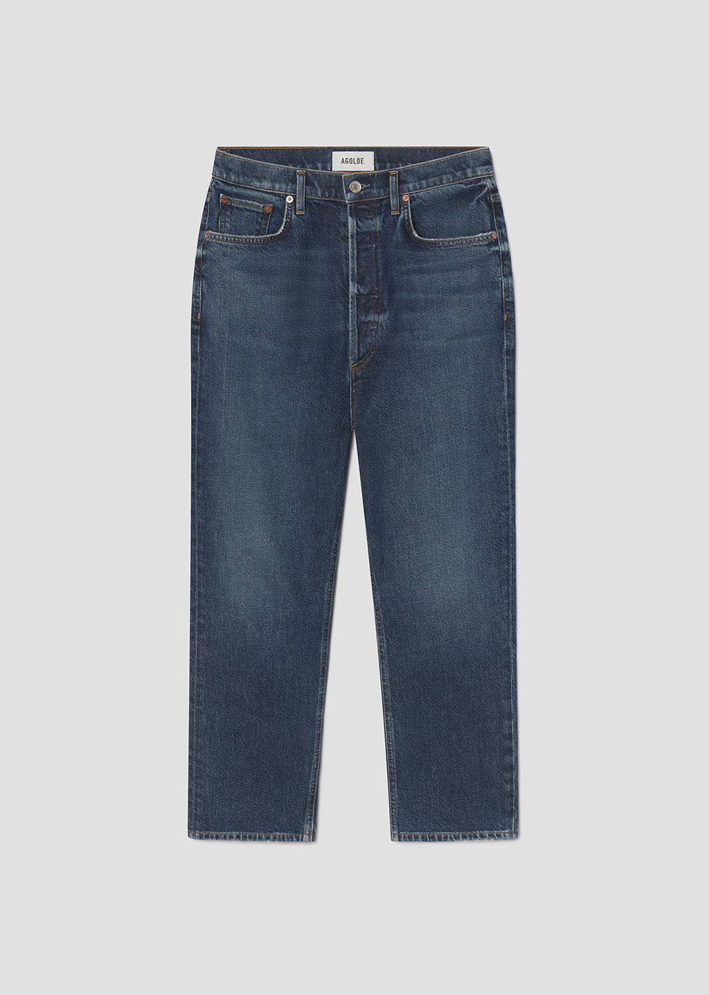Blue jeans on a light gray background
