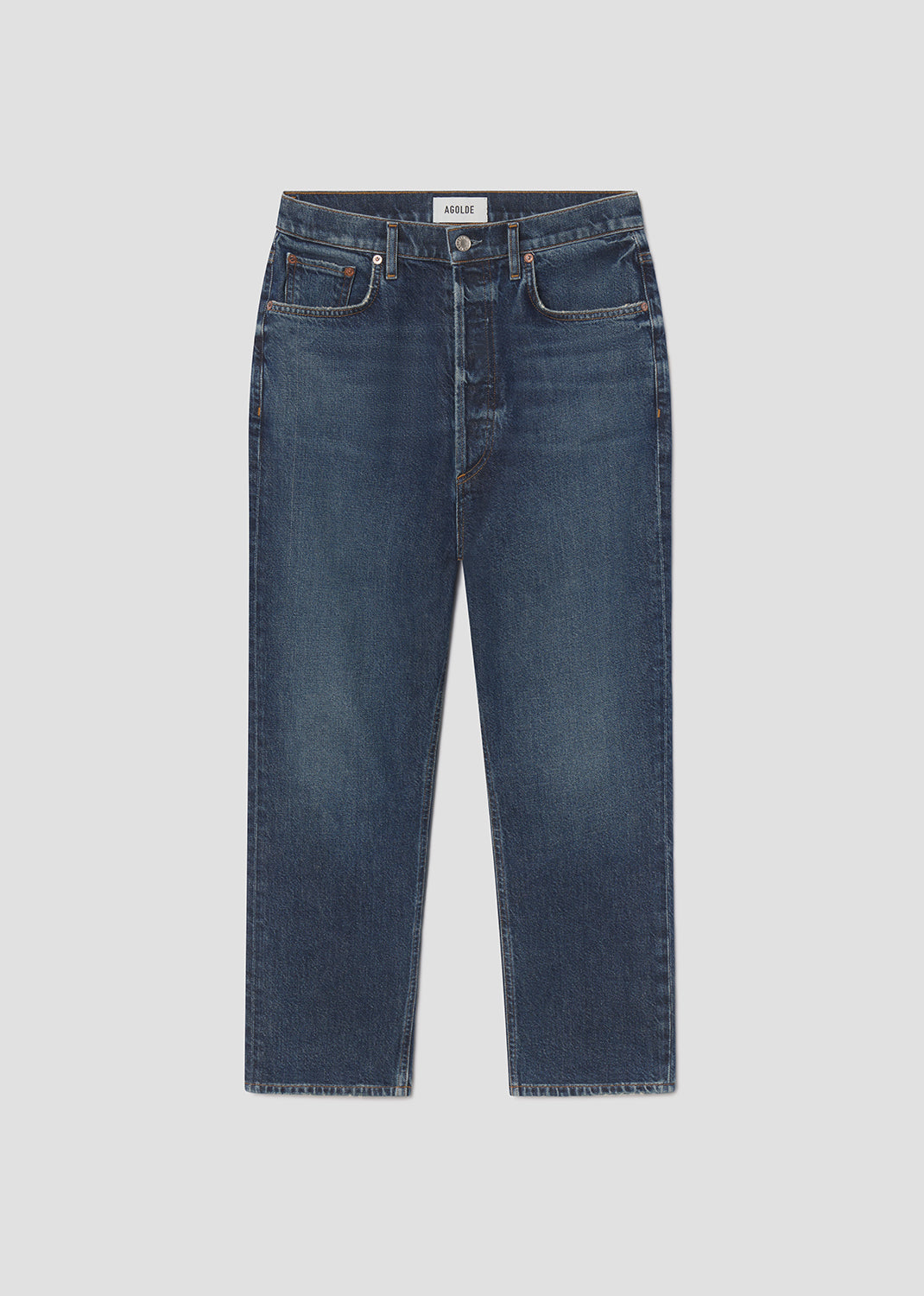 Blue jeans on a light gray background