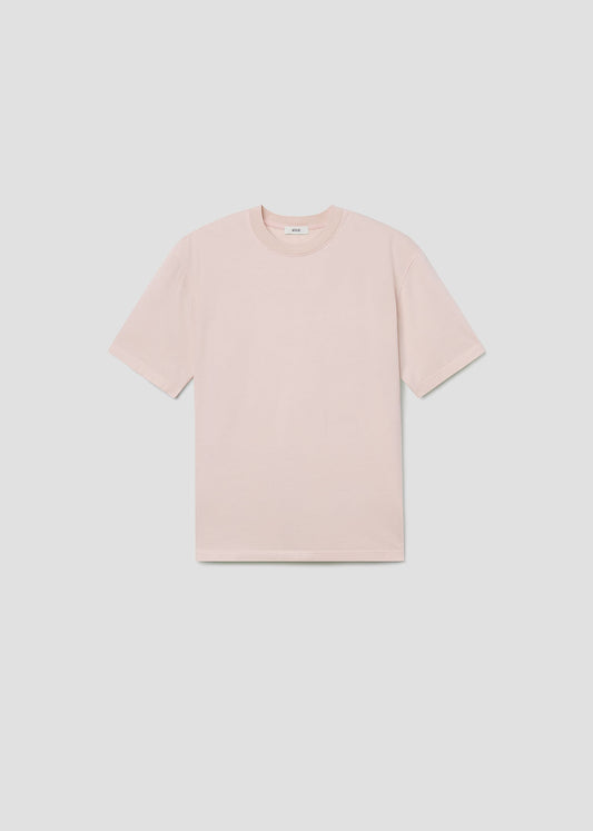 Light pink t-shirt on a light gray background