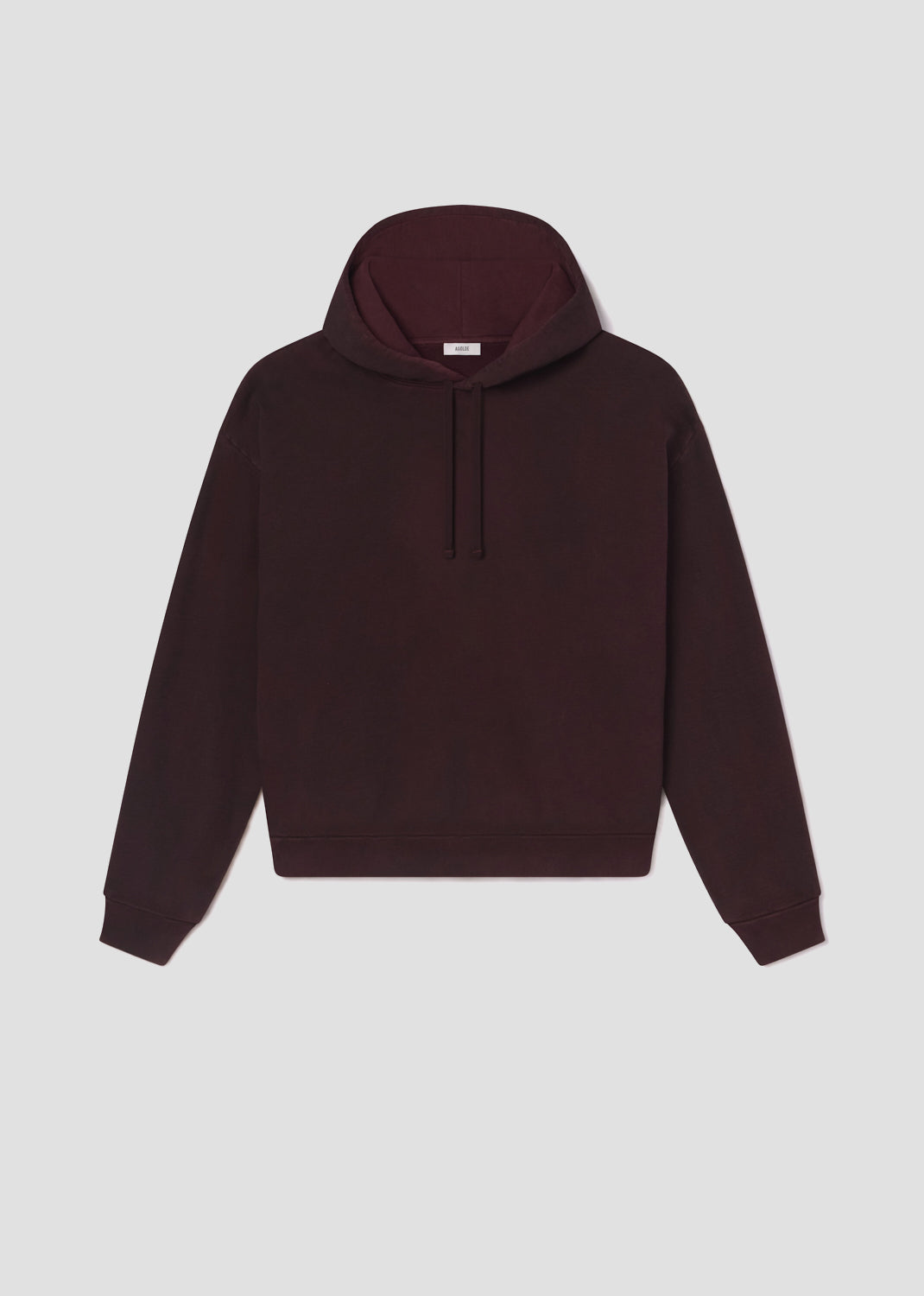 Maroon hoodie on a light gray background