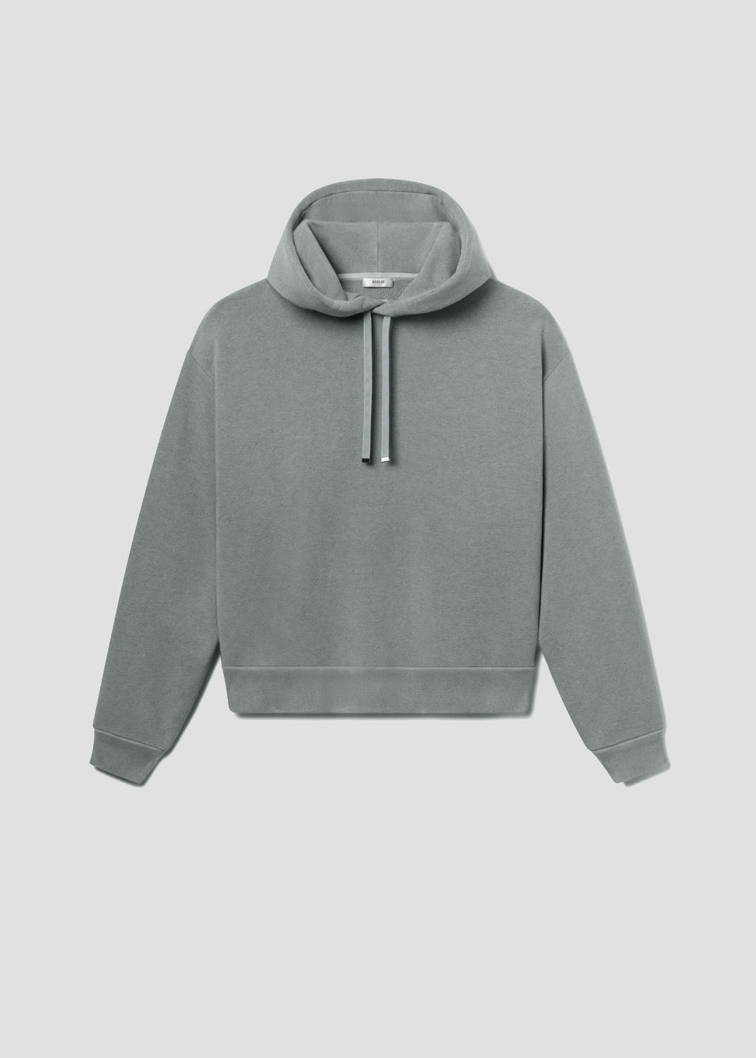 A gray green hoodie with a hood, long sleeves, and a drawstring.