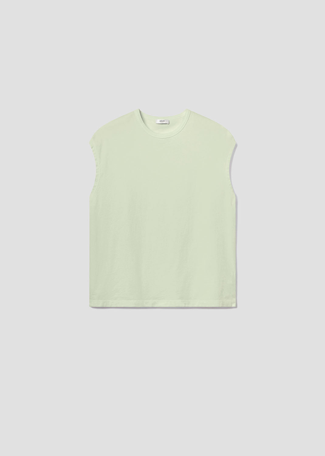 Light green sleeveless top on a light gray background