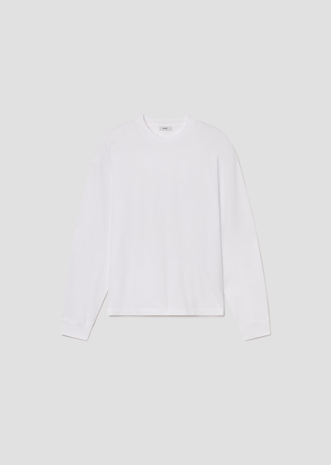 White long-sleeve shirt on a grey background