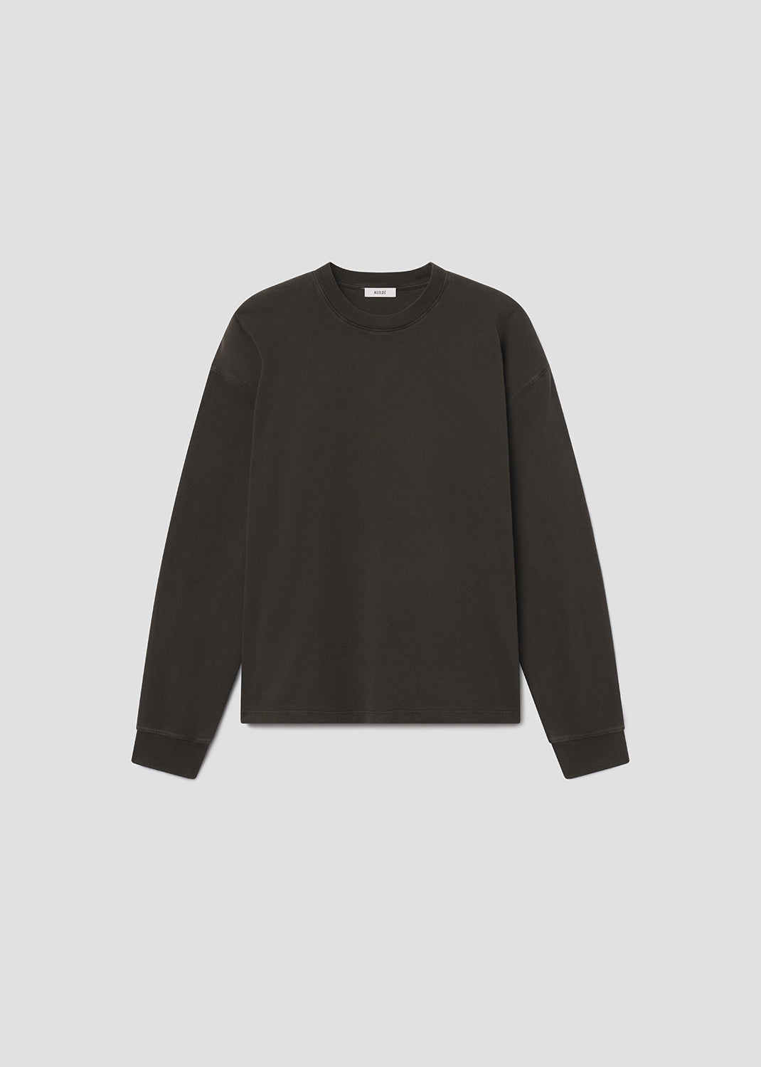 Black long-sleeve shirt on a light gray background