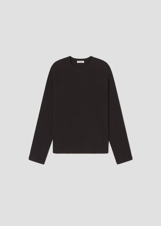 Black long-sleeve shirt on a light gray background