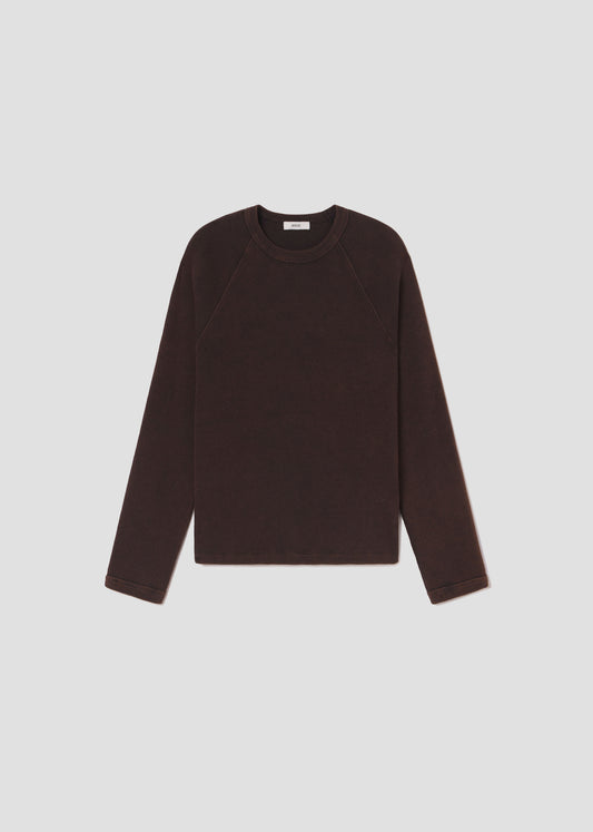 Brown long-sleeve shirt on a light gray background