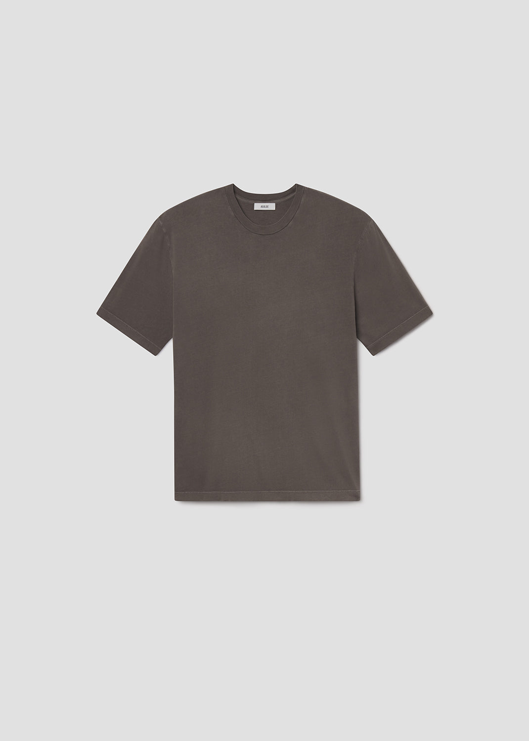 Plain dark grey t-shirt on a light grey background