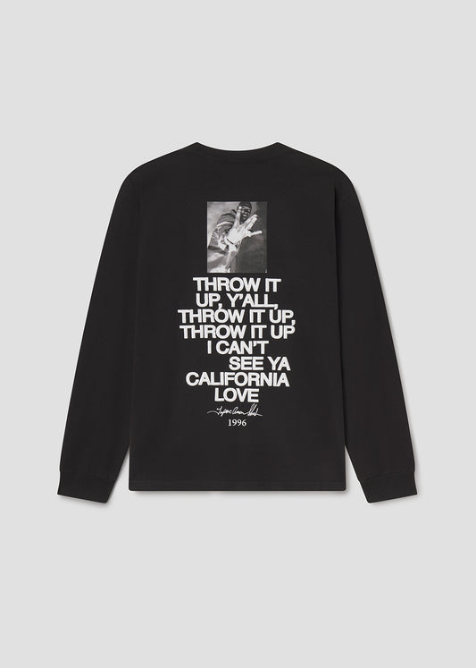 Black long-sleeve shirt with white text and a small graphic on a light gray background