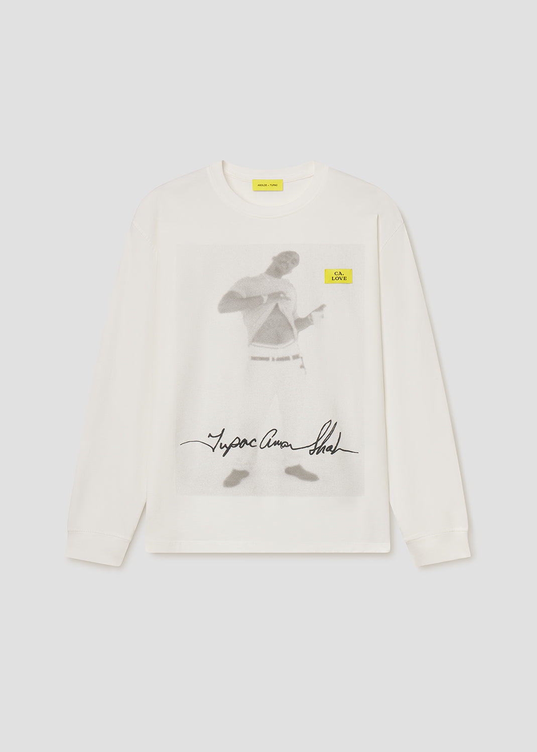 White long-sleeve shirt with graphic design and text on a white background