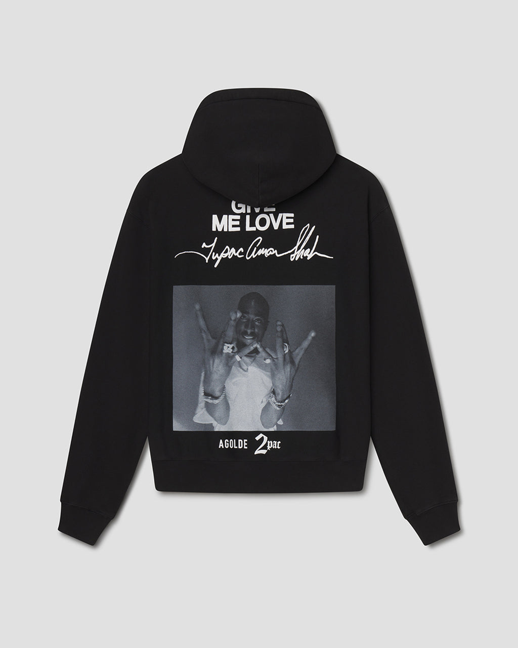 A black hoodie shown from the back, featuring a large graphic print with white text reading 'ME LOVE', a signature-style graphic, and a grayscale photo print on the back, set against a light gray background.