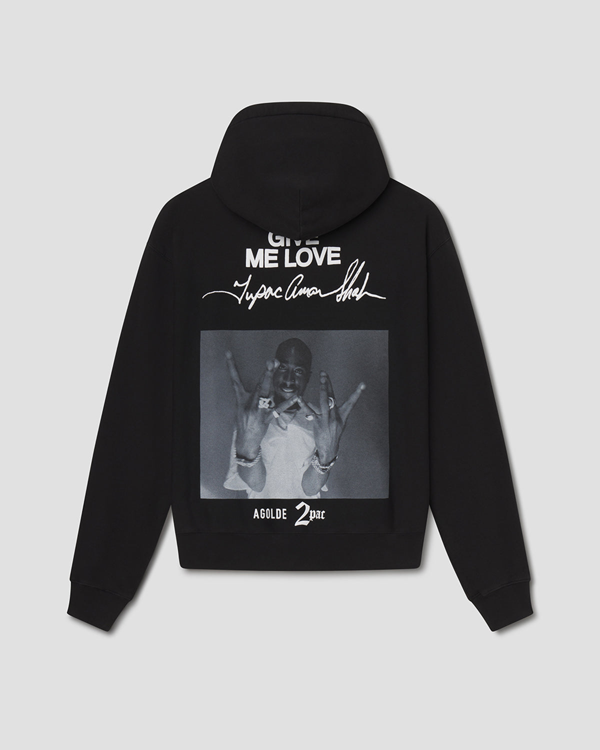 A black hoodie shown from the back, featuring a large graphic print with white text reading 'ME LOVE', a signature-style graphic, and a grayscale photo print on the back, set against a light gray background.
