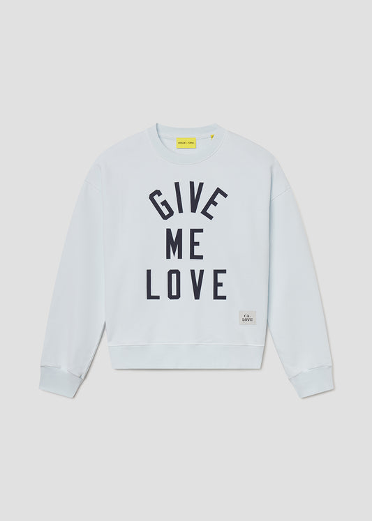 Light blue sweatshirt with 'Give Me Love' text on a light gray background