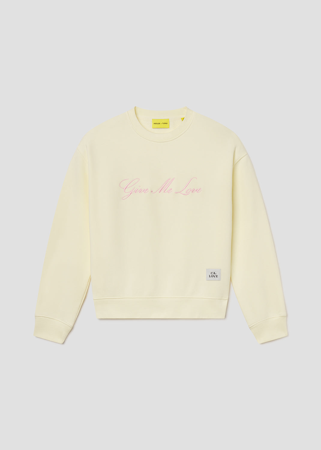 Light yellow sweatshirt with text on a light gray background