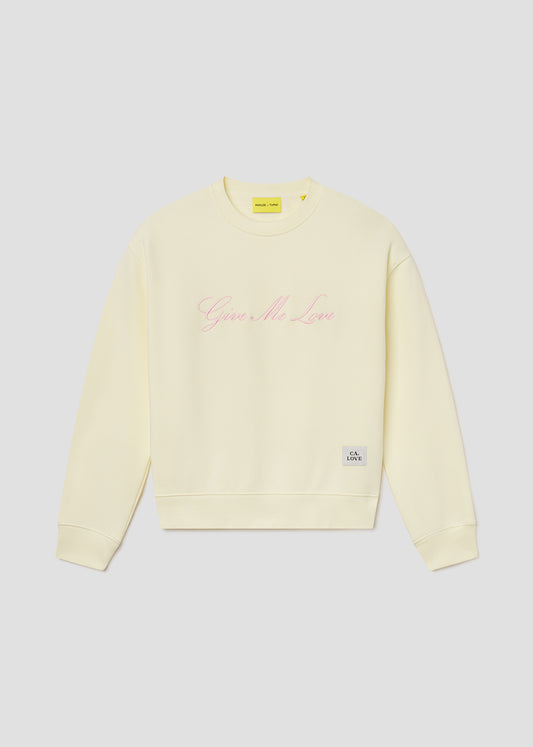 Light yellow sweatshirt with text on a light gray background