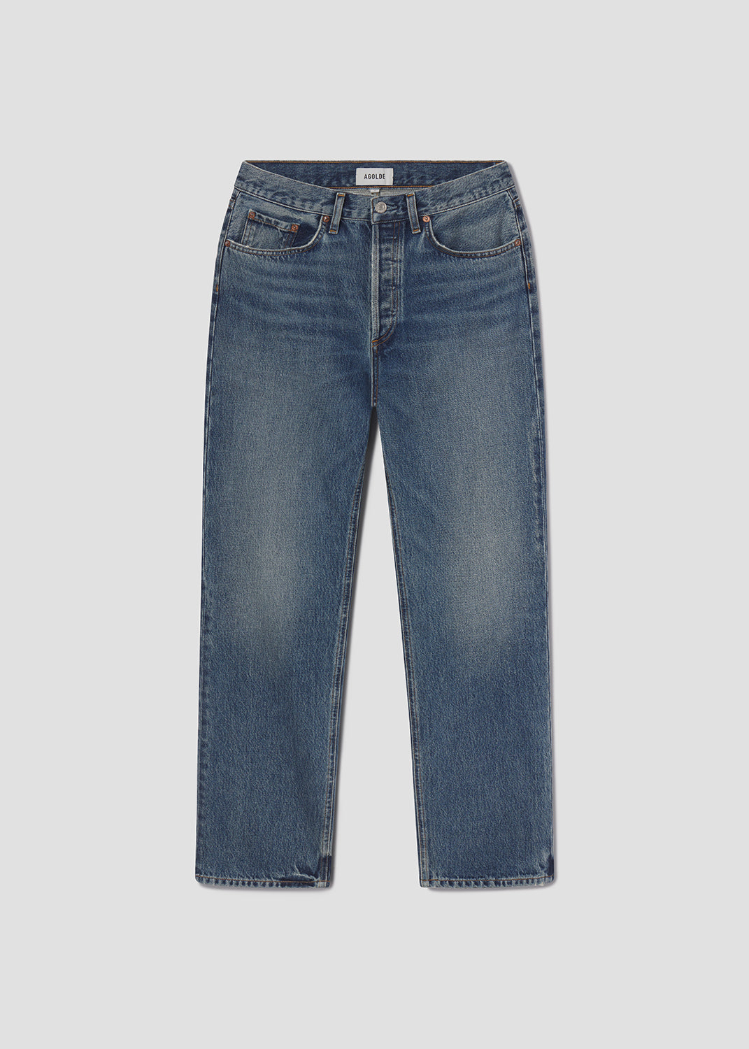 Blue jeans on a light gray background