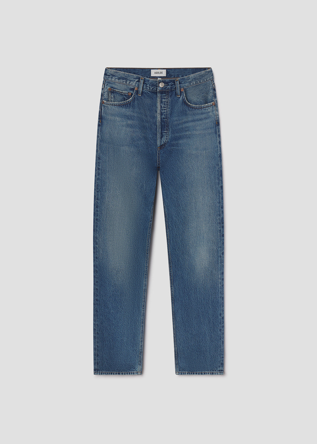 Blue jeans on a light gray background