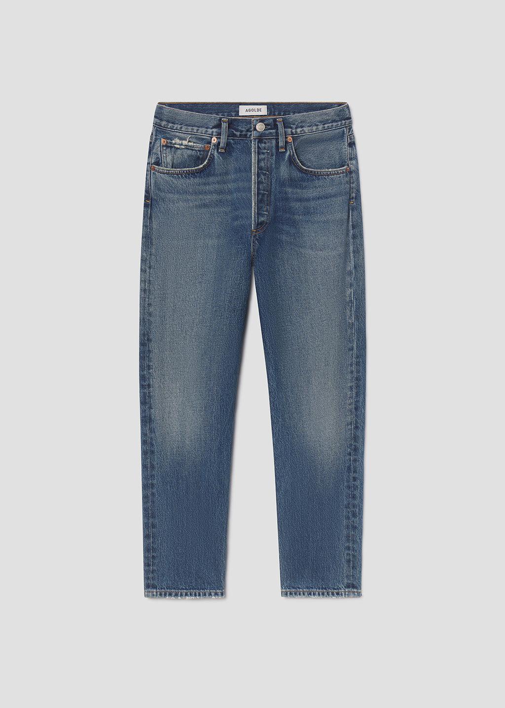 Blue jeans on a light gray background