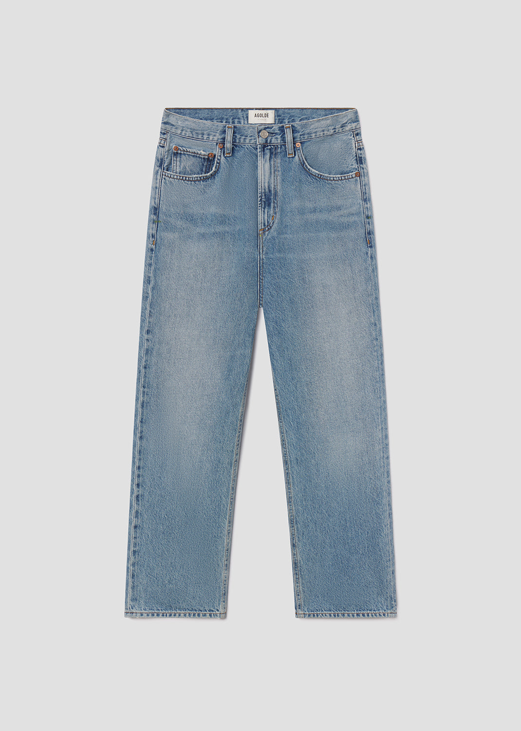 Blue jeans on a light gray background