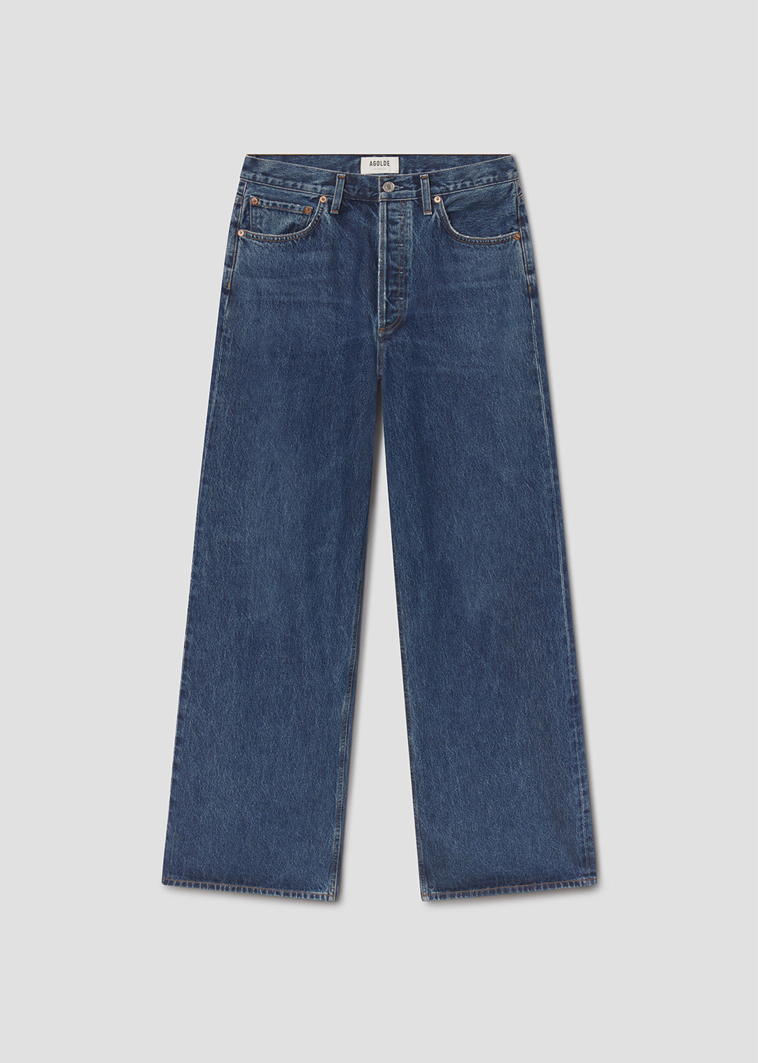Blue jeans on a light gray background
