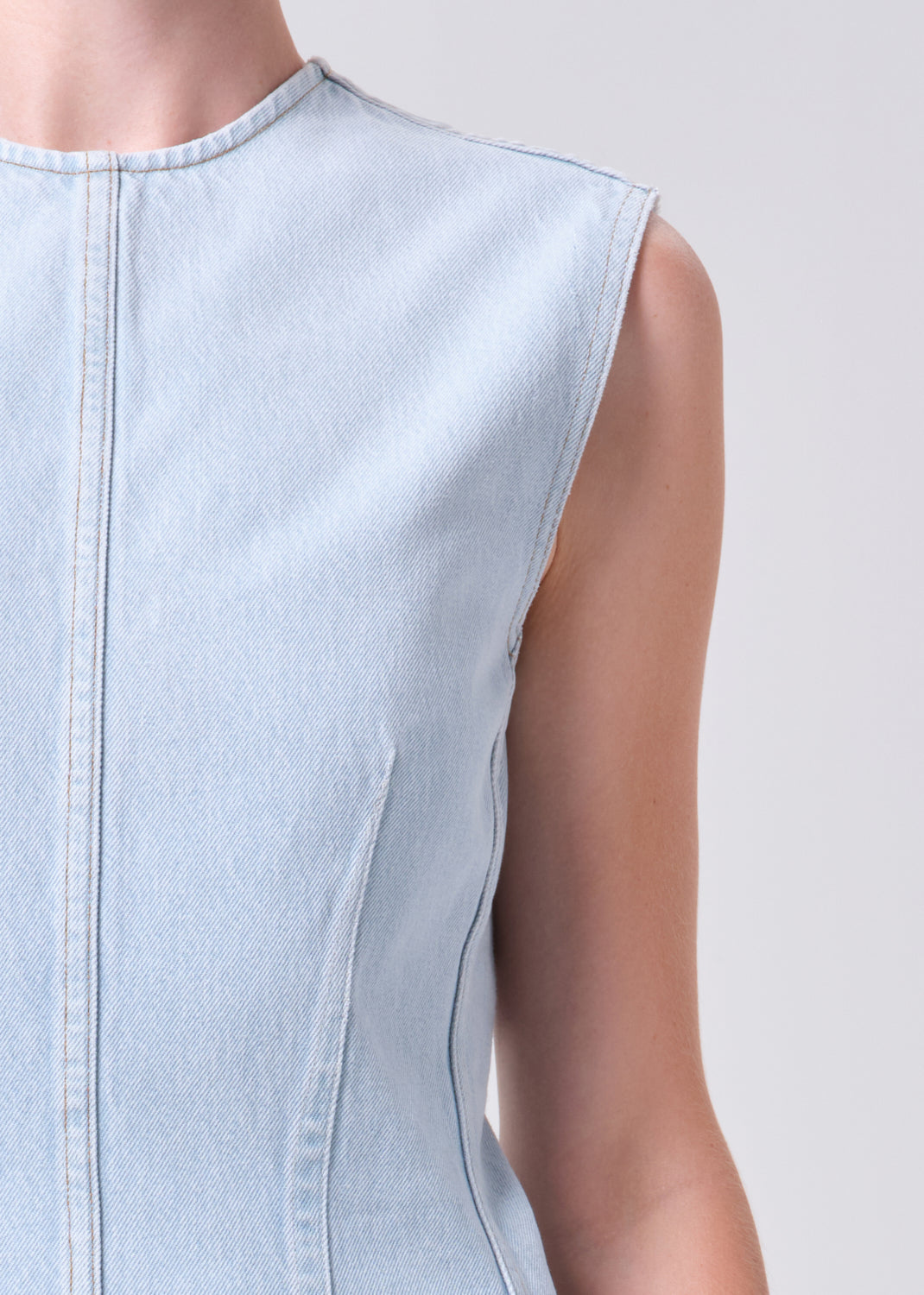 Light blue sleeveless dress on a plain background