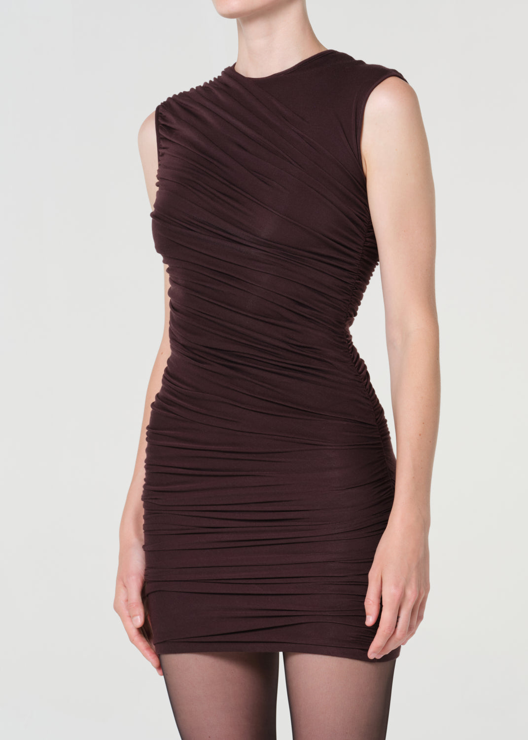Brown ruched dress on a plain background