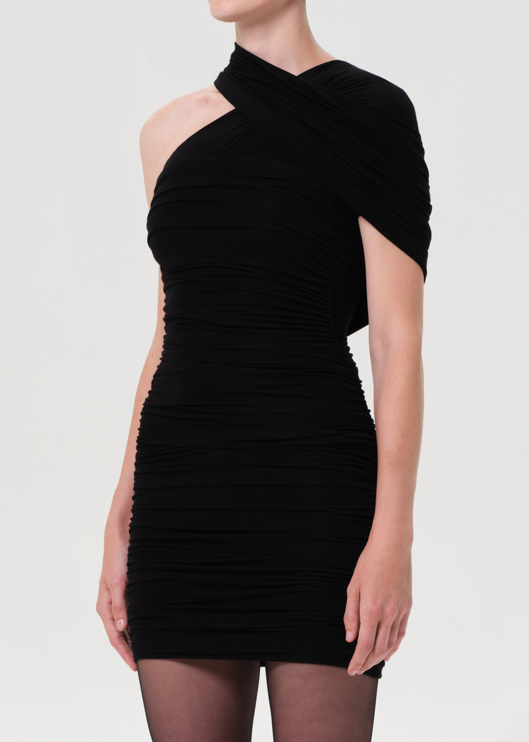 Black one-shoulder dress on a white background