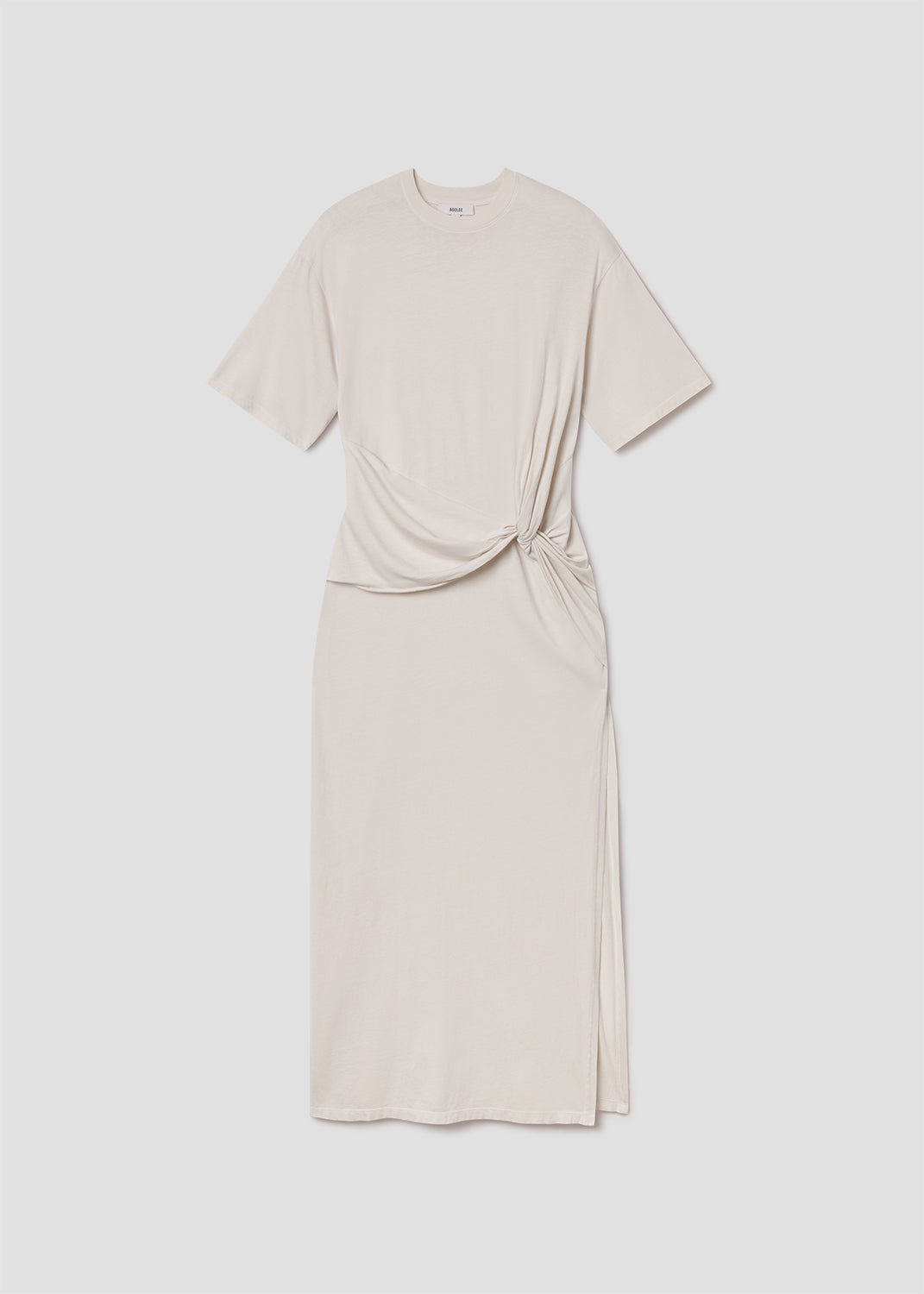 Beige dress with a draped effect on a white background