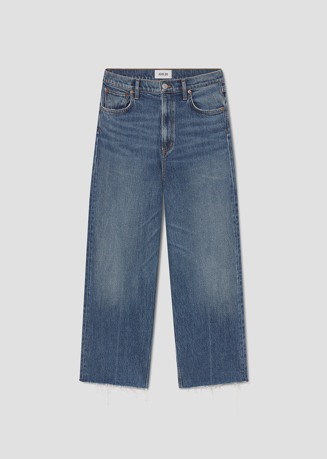 Blue jeans on a light gray background