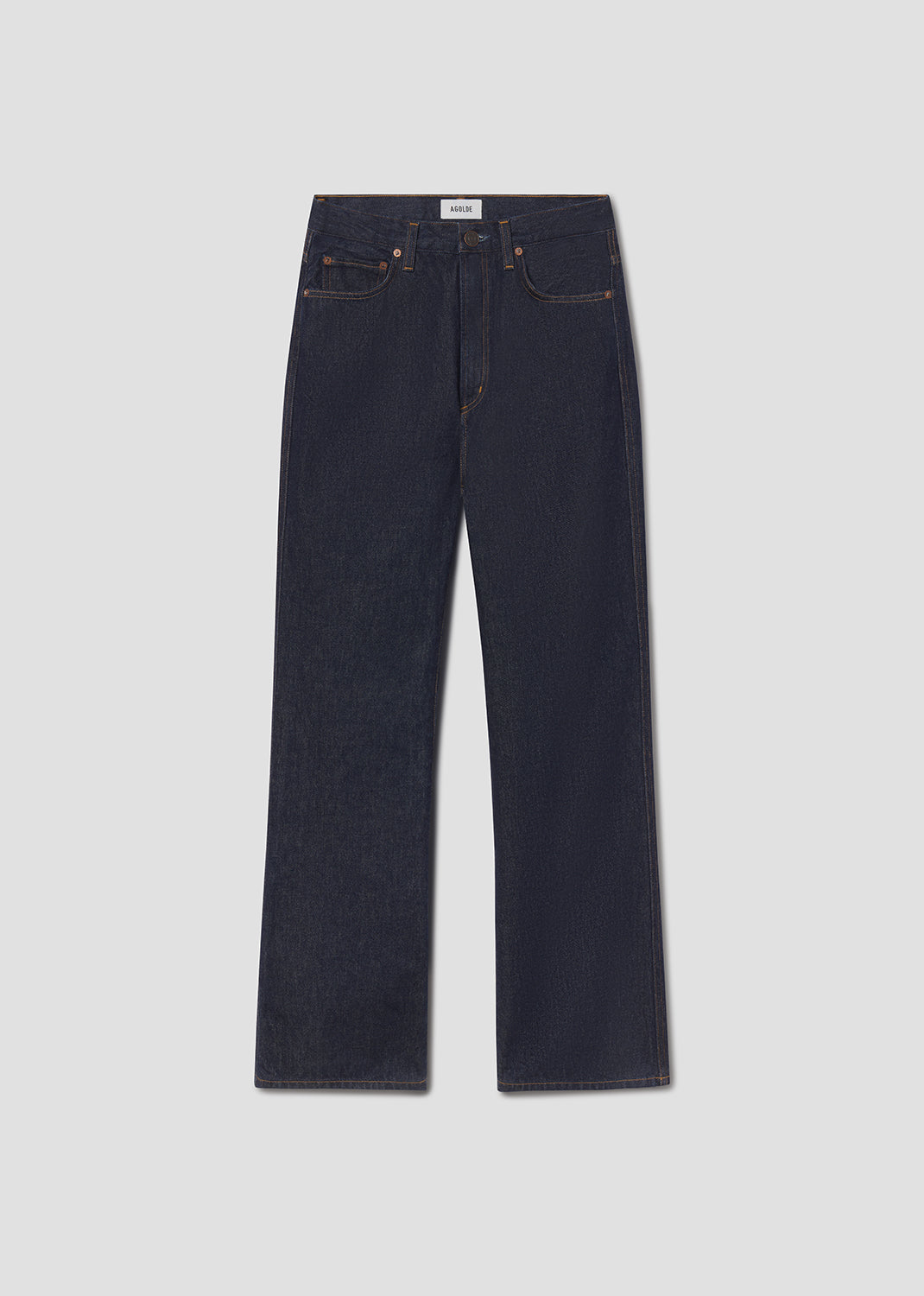 Pair of dark blue jeans on a light gray background