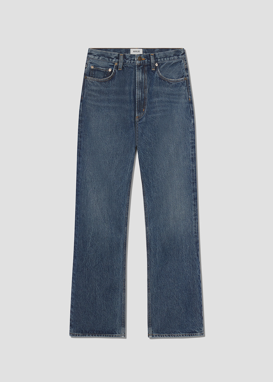Blue jeans on a light gray background