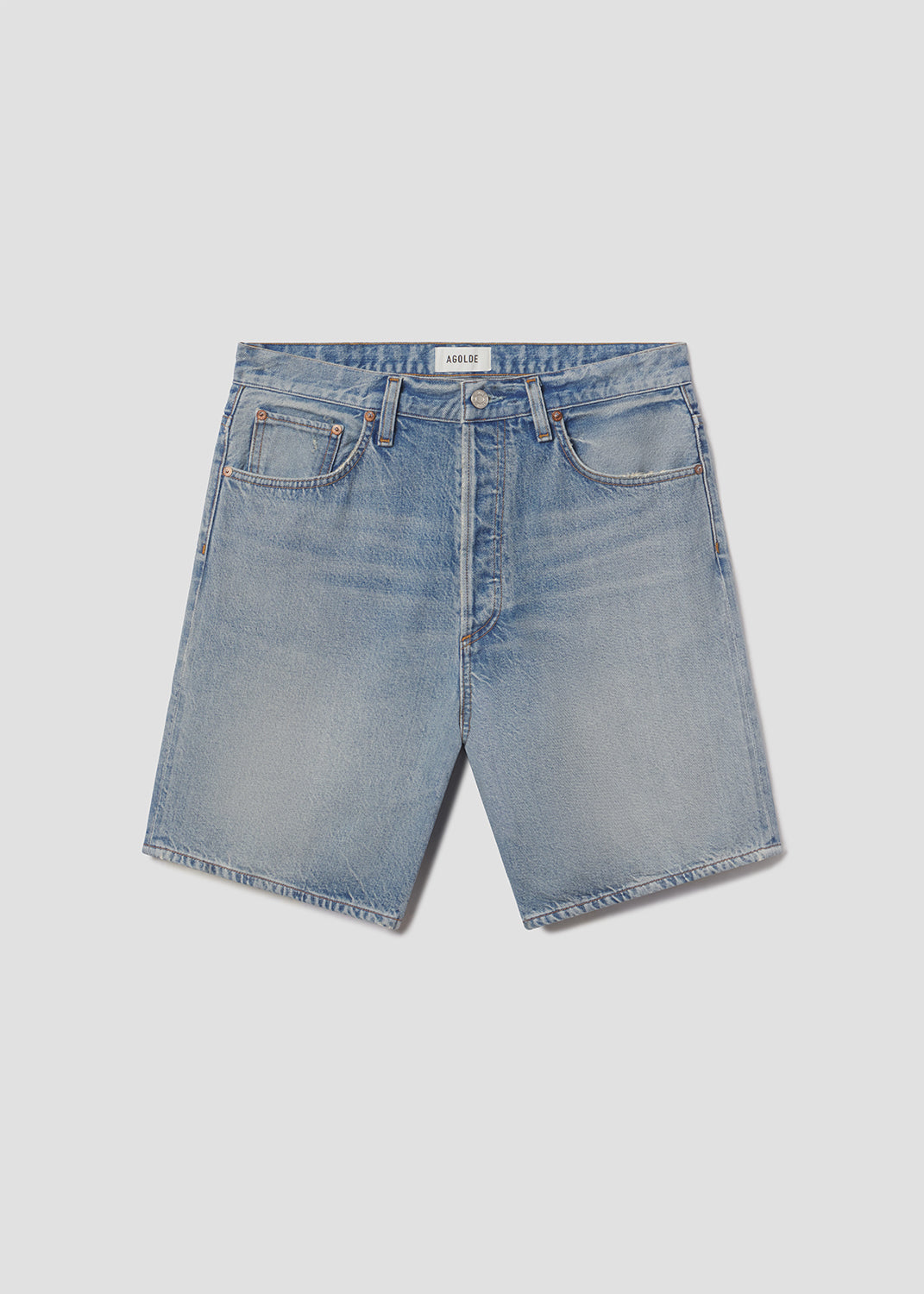 Light blue denim shorts on a light gray background