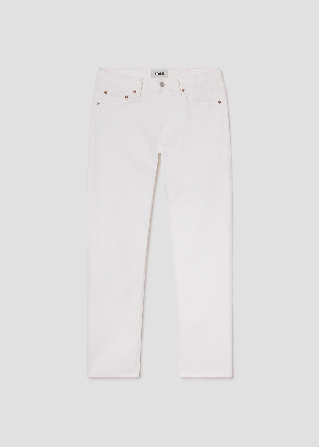 White jeans with red buttons on a light gray background