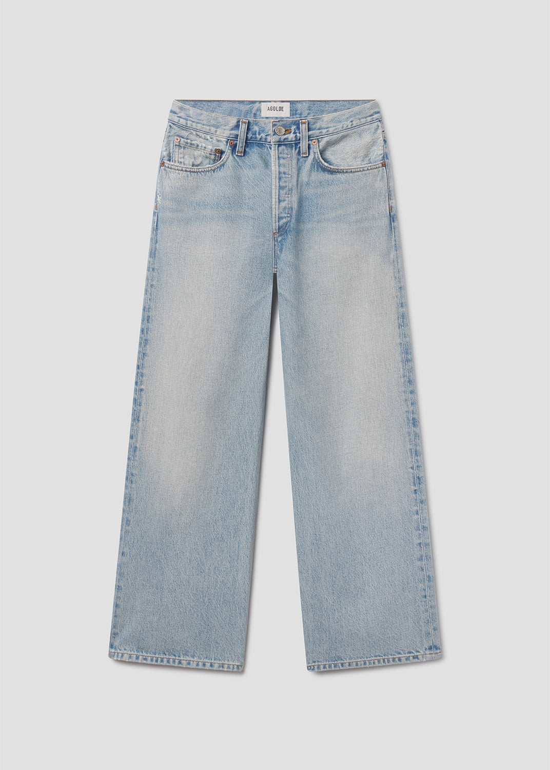 Light blue jeans on a light gray background