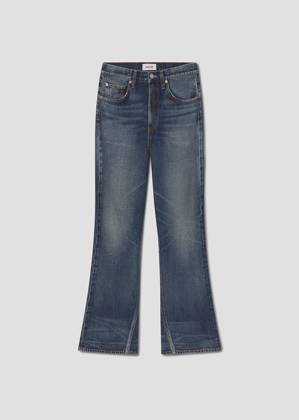 Pair of blue jeans on a light gray background
