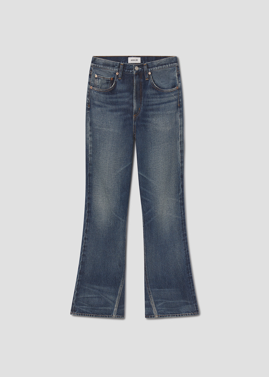 Pair of blue jeans on a light gray background